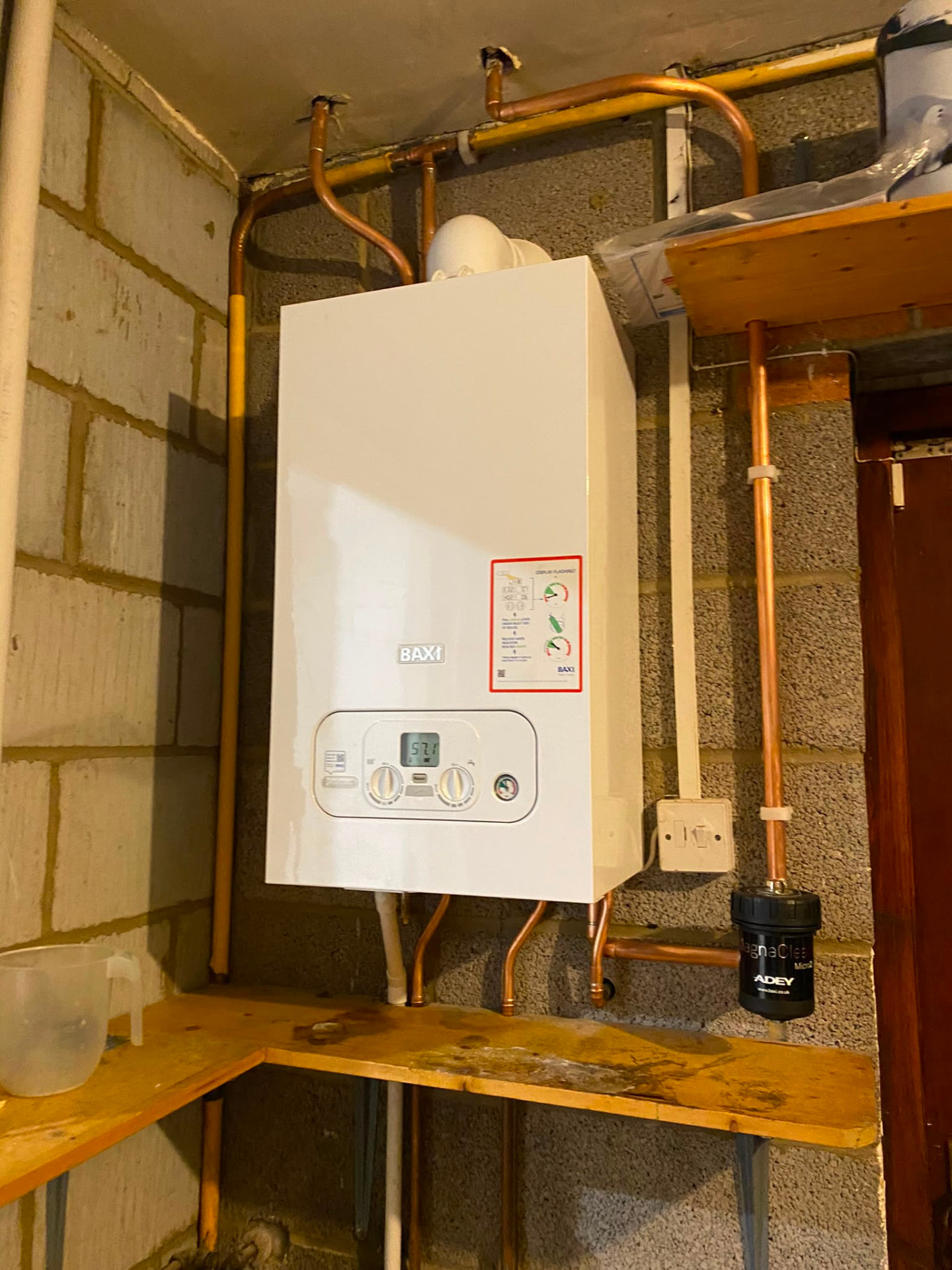 New Baxi combi boiler installed in Bedlington with tidy copper pipework and MagnaClean filter