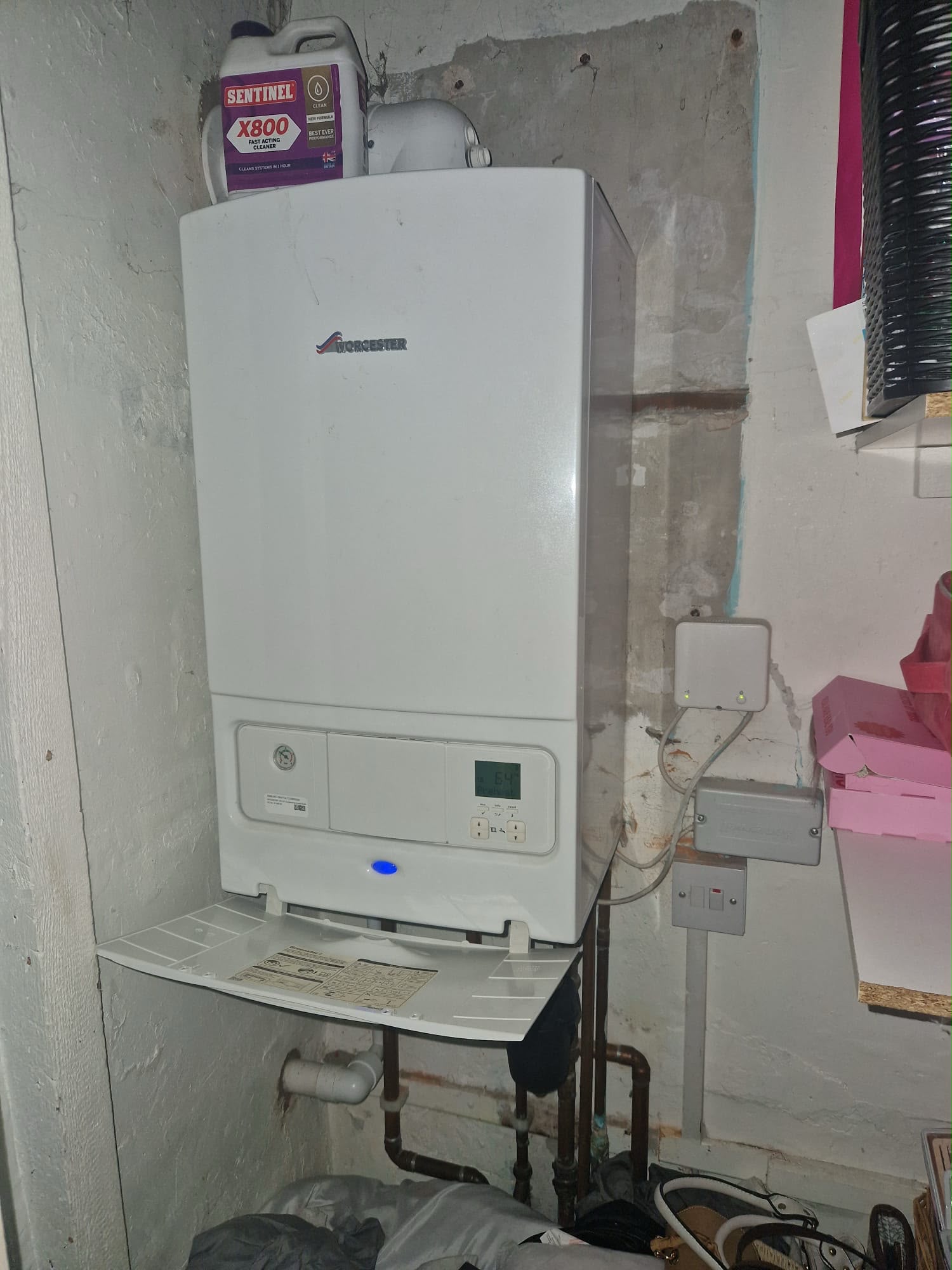 Worcester boiler after repair with Sentinel X800 cleaner on top and tidy pipework underneath